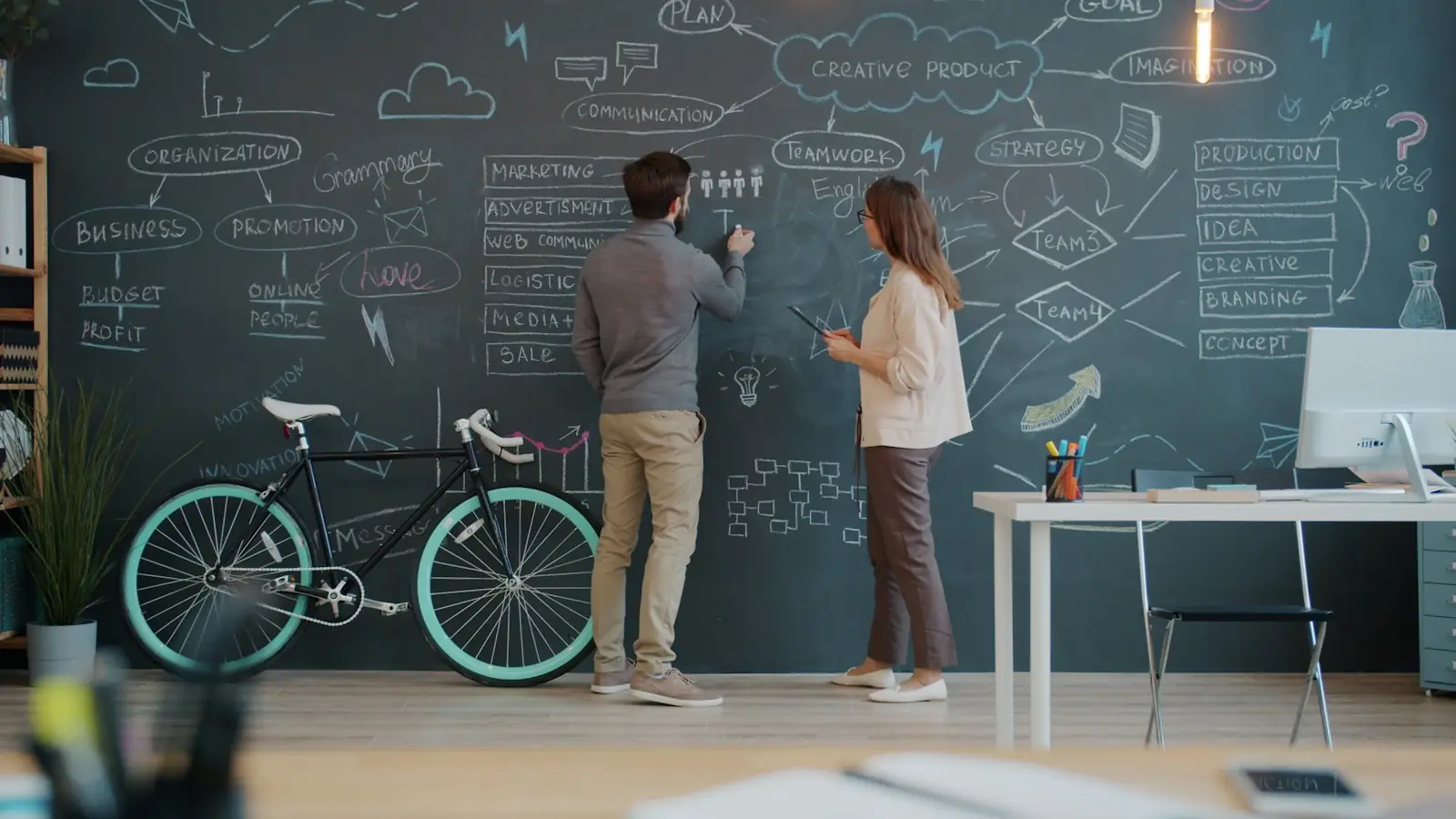 Drawing ideas on a chalkboard wall